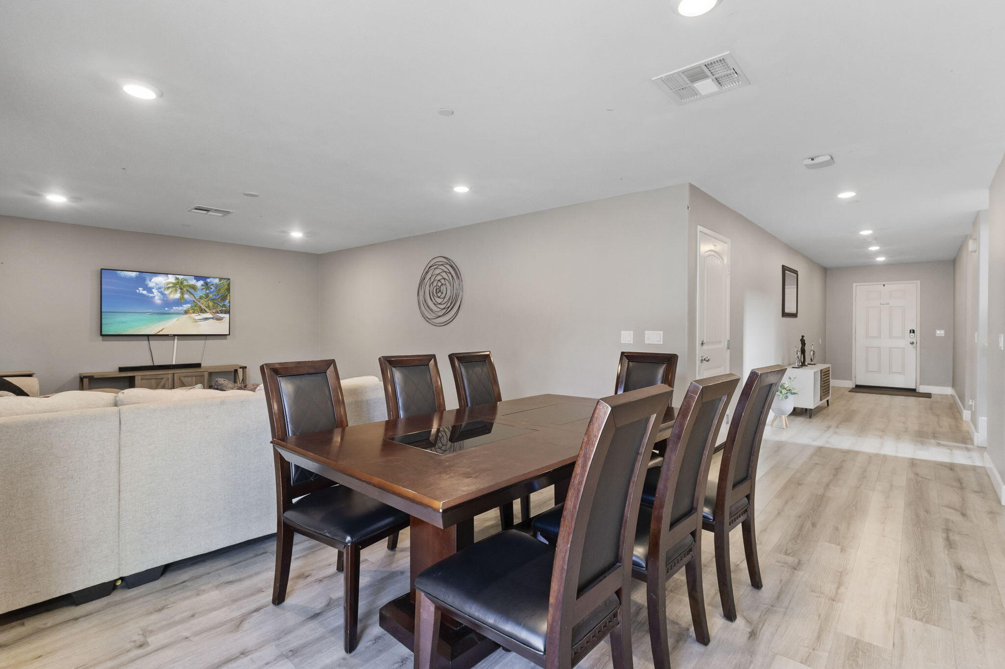 32486 Roman Warren Way Winchester, CA 92596 - Photo 25 of 45 a view of a dining room with furniture and wooden floor
