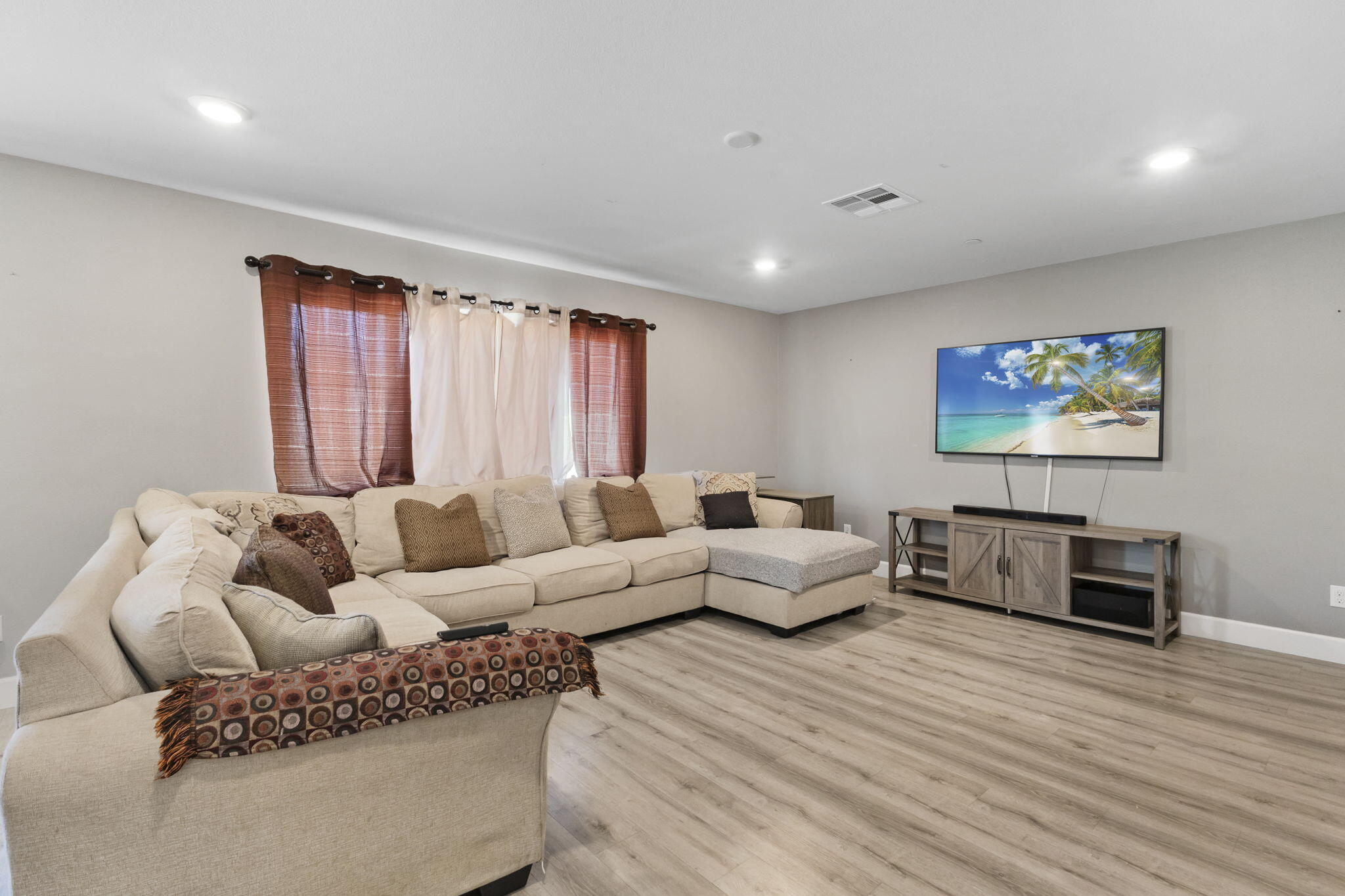 32486 Roman Warren Way Winchester, CA 92596 - Photo 27 of 45 a living room with furniture and a hard wood floor