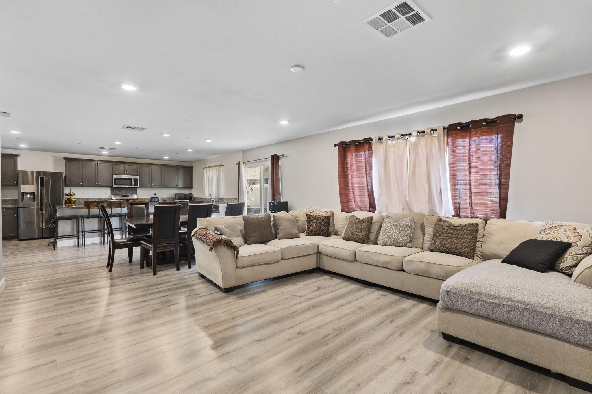 32486 Roman Warren Way Winchester, CA 92596 - Photo 28 of 45 a living room with furniture and wooden floor