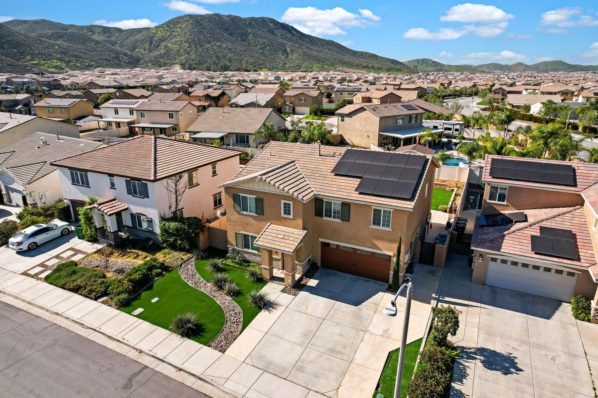 32486 Roman Warren Way Winchester, CA 92596 - Photo 3 of 45 an aerial view of a house with a yard