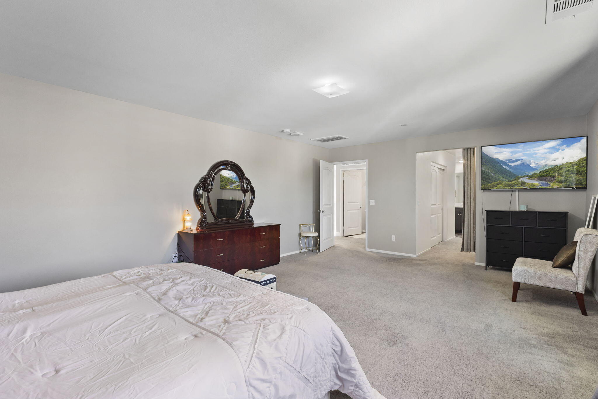 32486 Roman Warren Way Winchester, CA 92596 - Photo 31 of 45 a bedroom with a bed and a couch