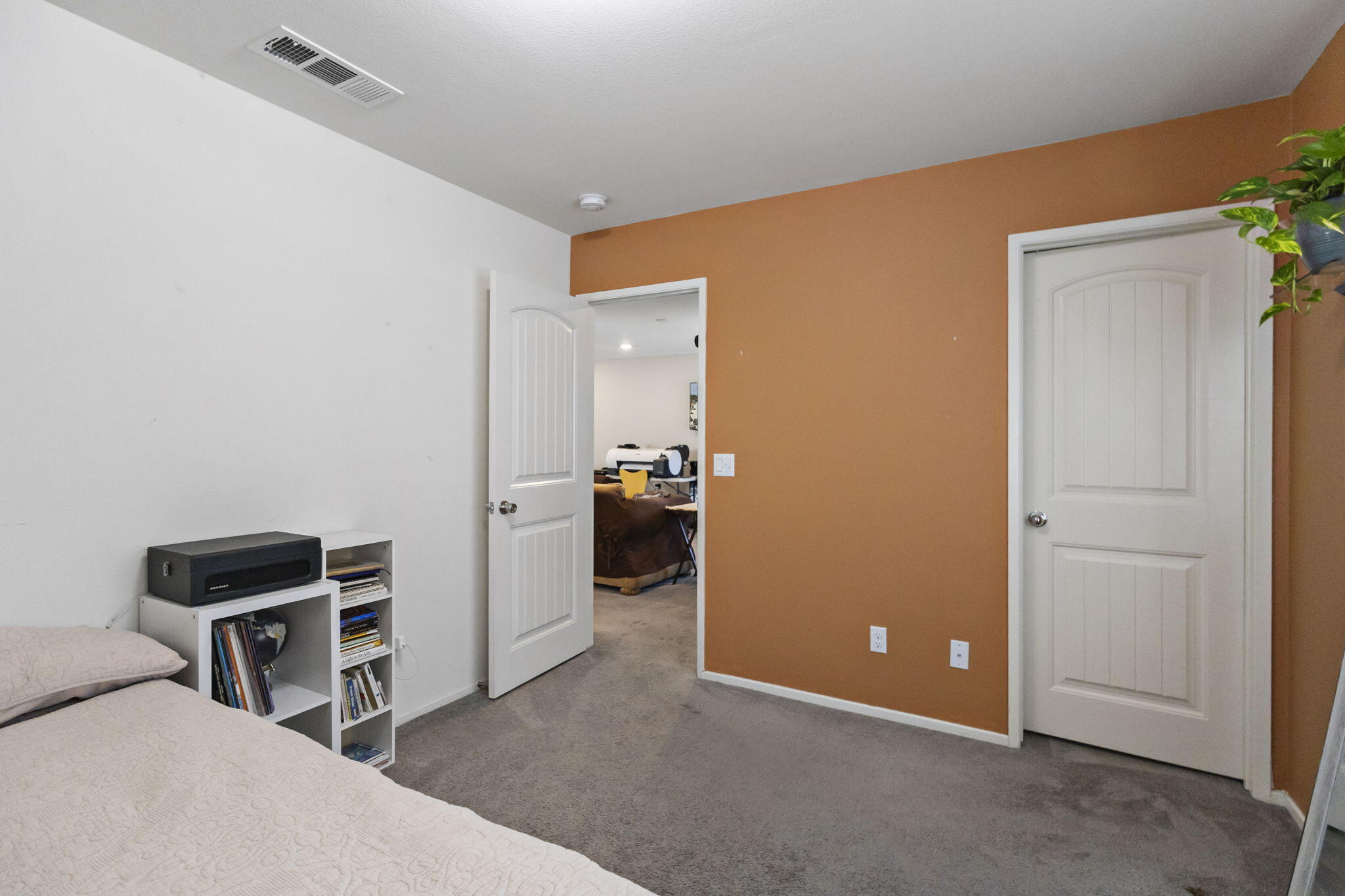 32486 Roman Warren Way Winchester, CA 92596 - Photo 37 of 45 a view of a livingroom with furniture and an empty room