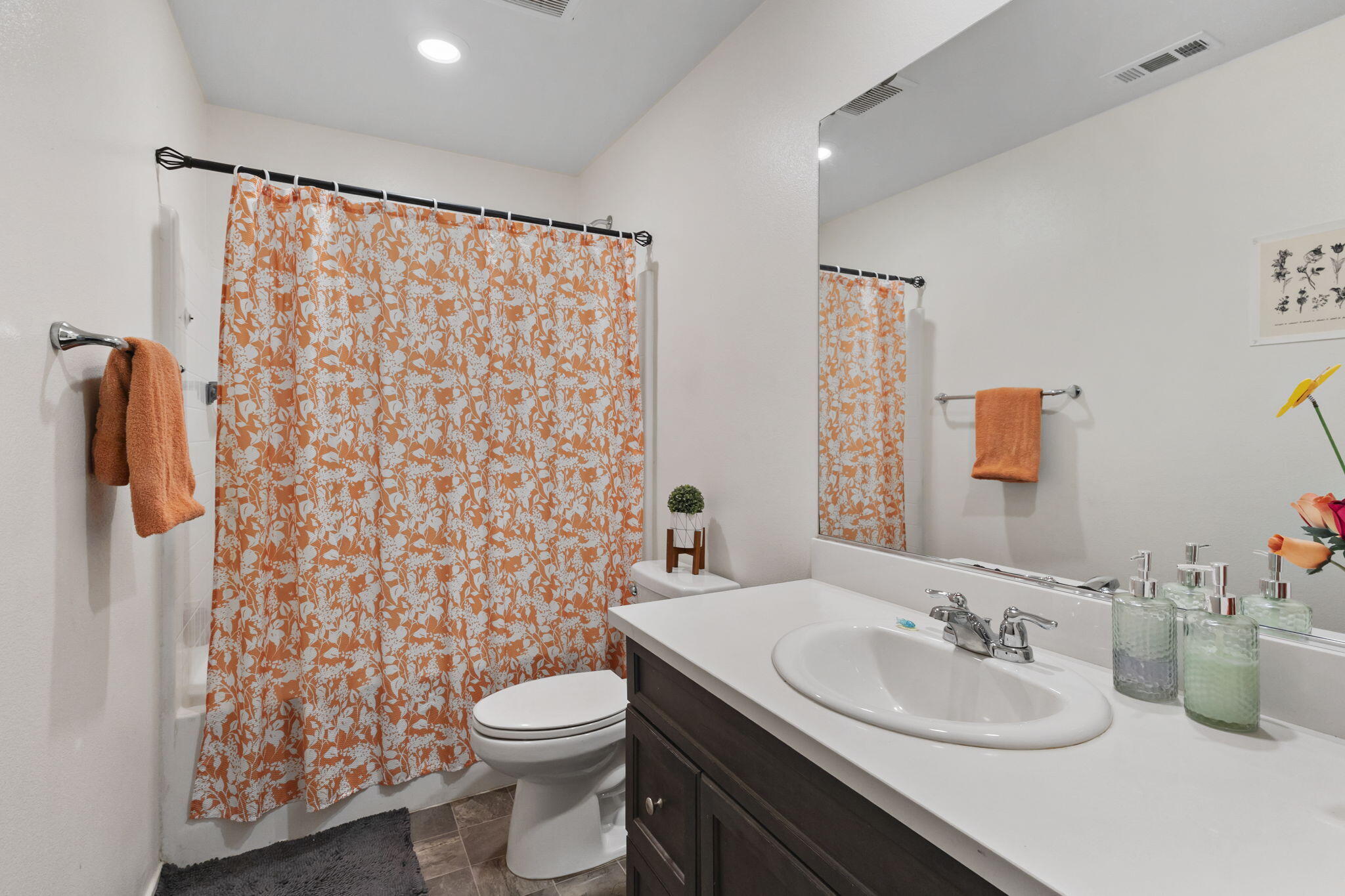 32486 Roman Warren Way Winchester, CA 92596 - Photo 38 of 45 a bathroom with a sink and a mirror