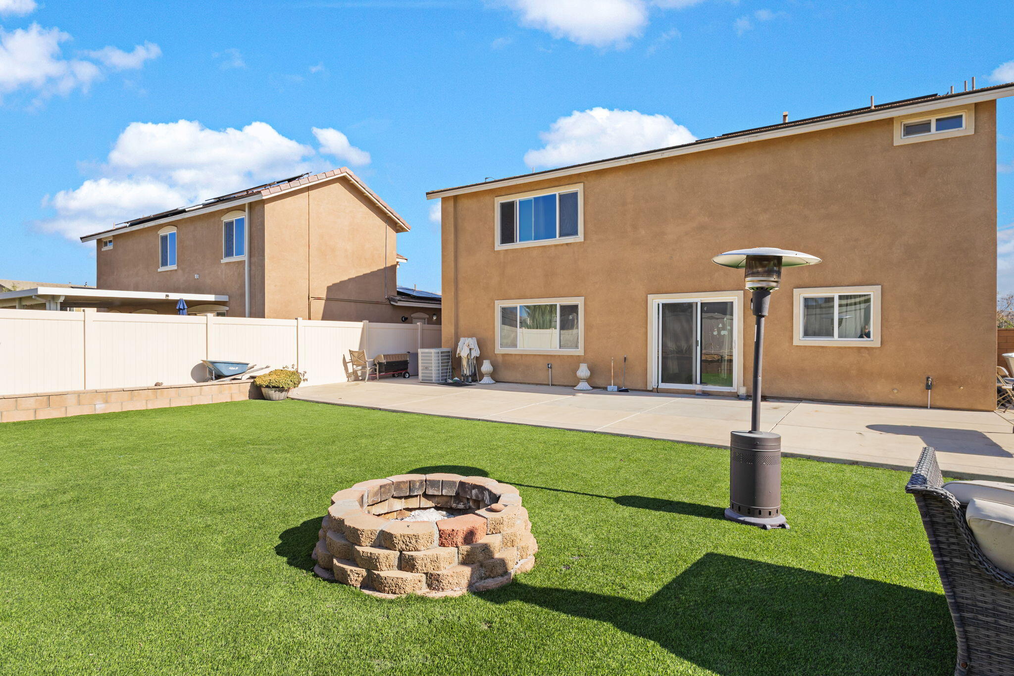 32486 Roman Warren Way Winchester, CA 92596 - Photo 44 of 45 a front view of a house with a yard
