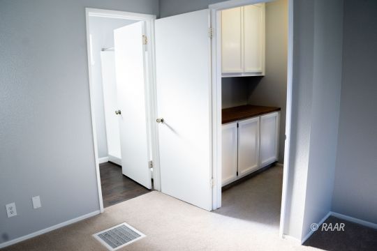 148 South Lilac Street Ridgecrest, CA 93555 - Photo 28 of 34 a view of walk in closet
