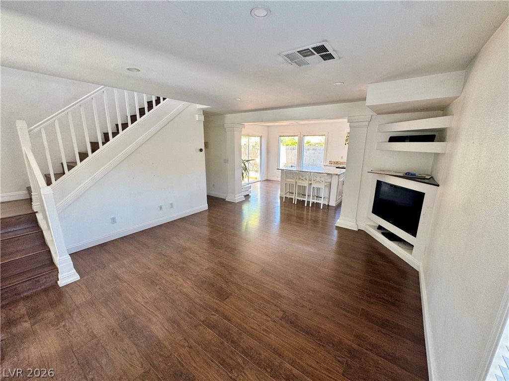 8920 Argus Reed Avenue Las Vegas, NV 89148 - Photo 4 of 10 This inviting interior features elegant flooring and an open-concept design, perfect for modern living.