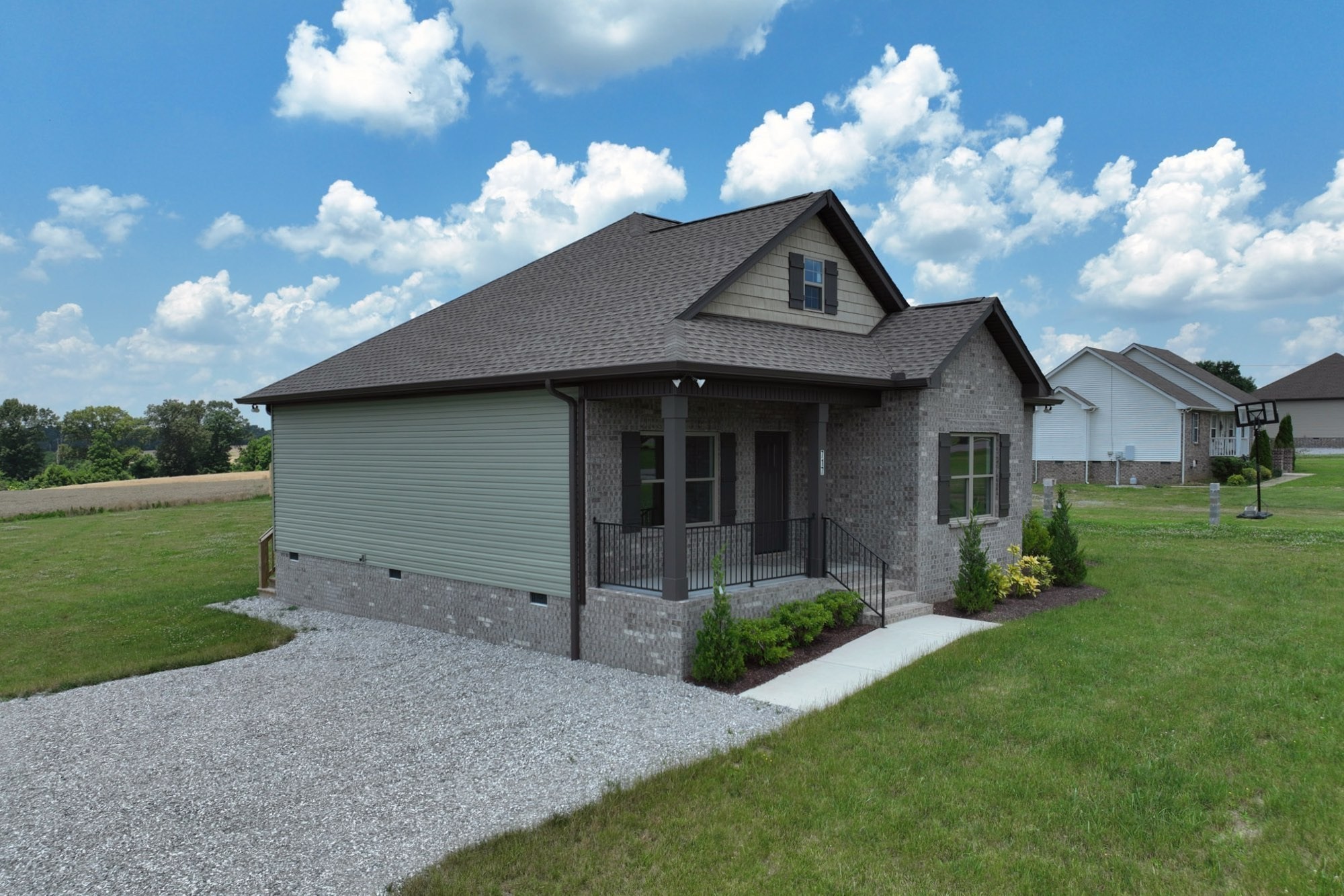 725 Lear Road Portland, TN 37148 - Photo 4 of 50 a front view of a house with garden