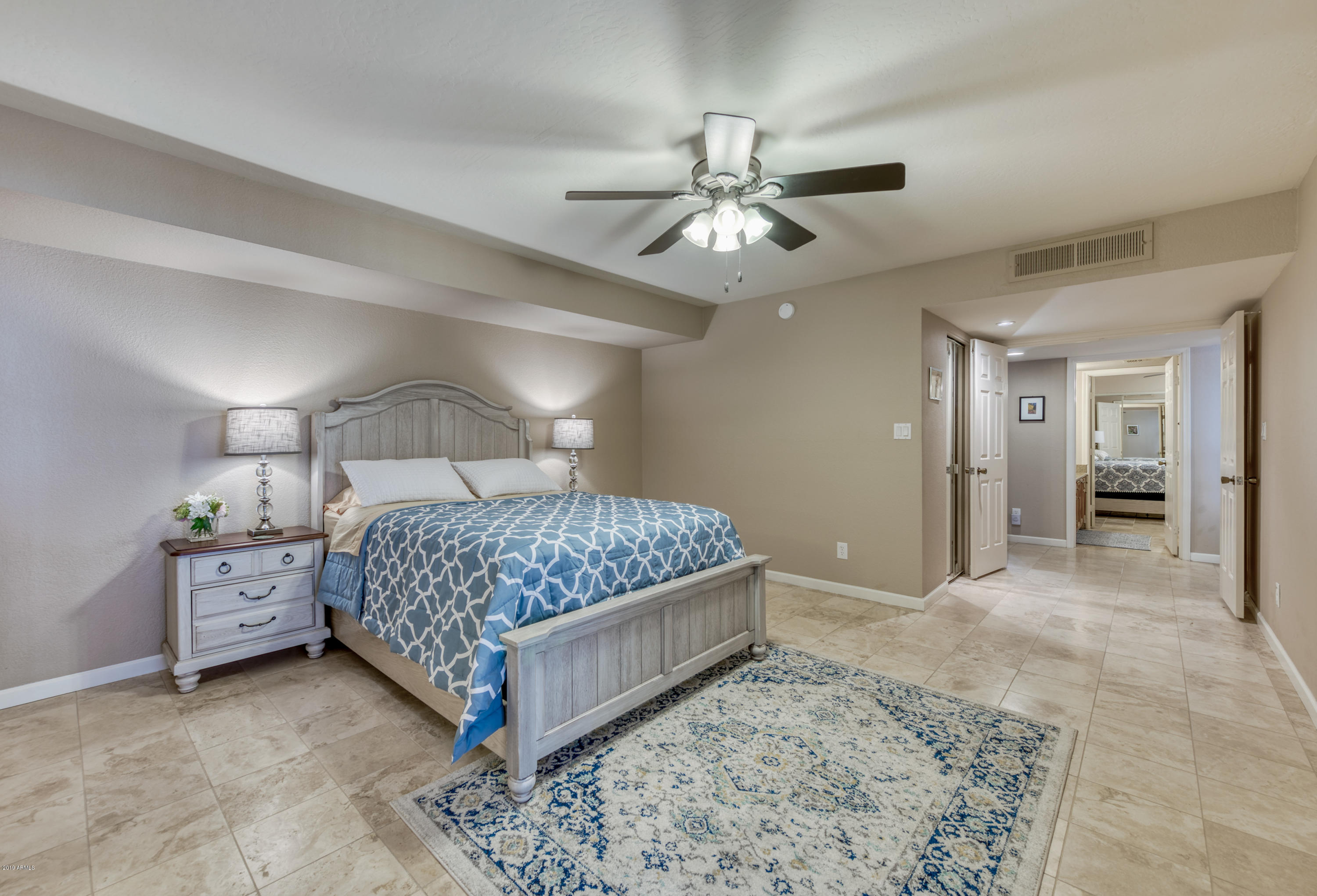 9445 North 94th Place, Unit 120 Scottsdale, AZ 85258 - Photo 12 of 17 Master Bedroom