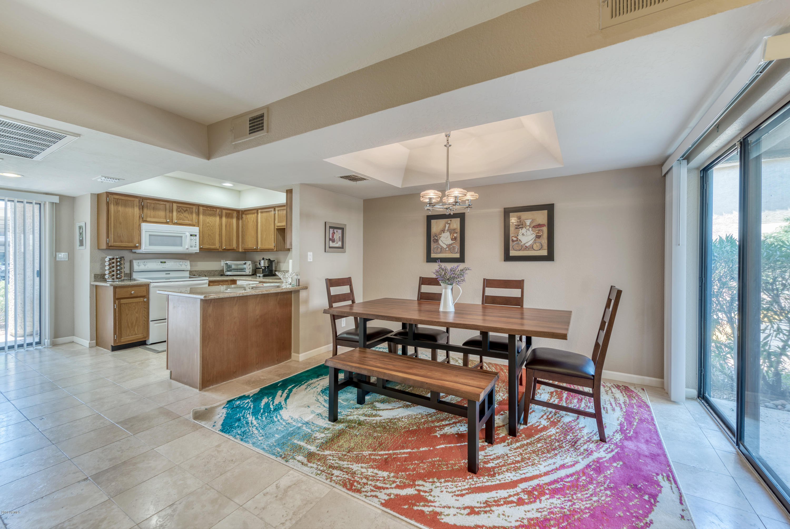 9445 North 94th Place, Unit 120 Scottsdale, AZ 85258 - Photo 7 of 17 Dining Room ~ Kitchen