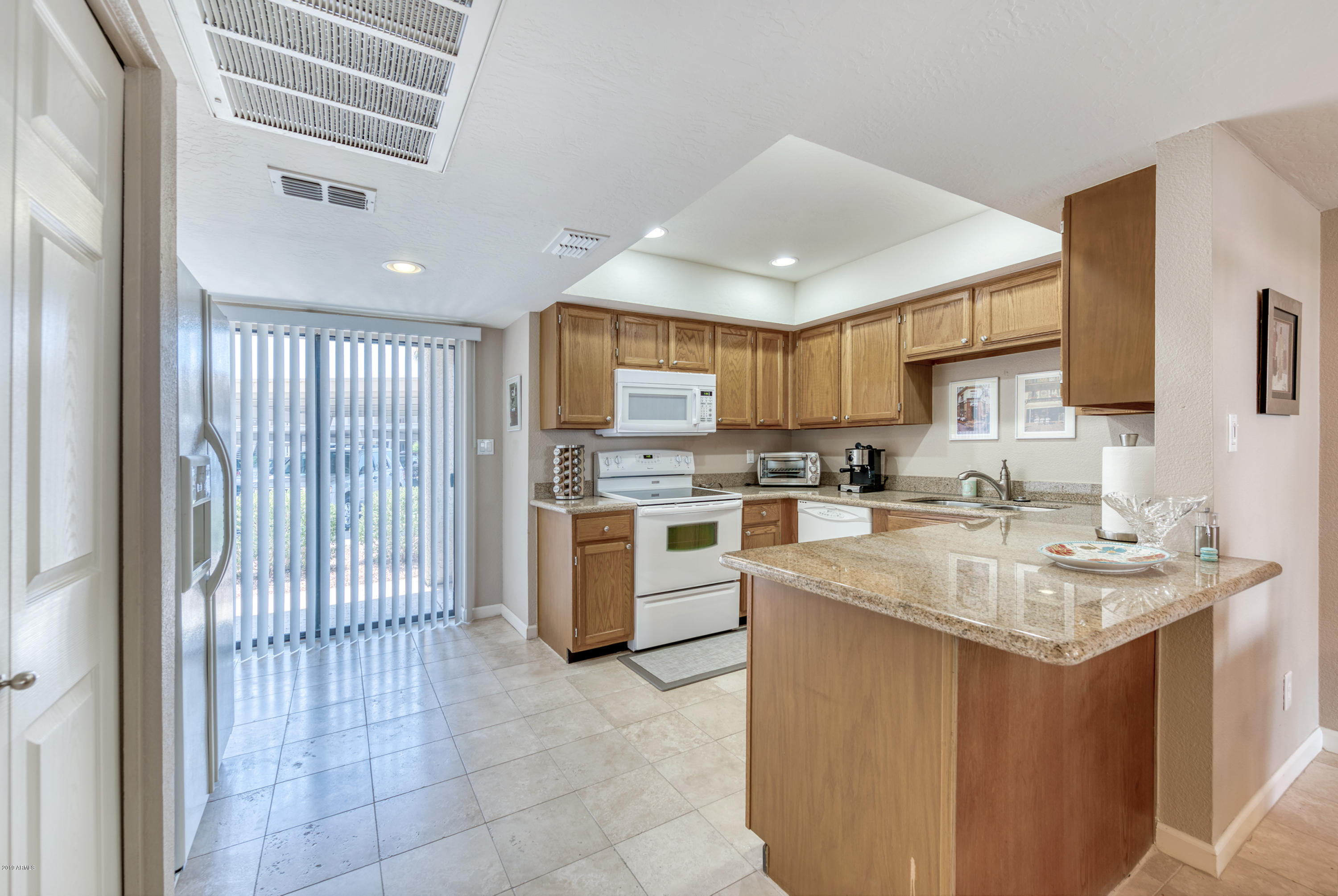 9445 North 94th Place, Unit 120 Scottsdale, AZ 85258 - Photo 8 of 17 Kitchen