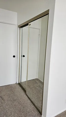 a view of small space with racks on the wall