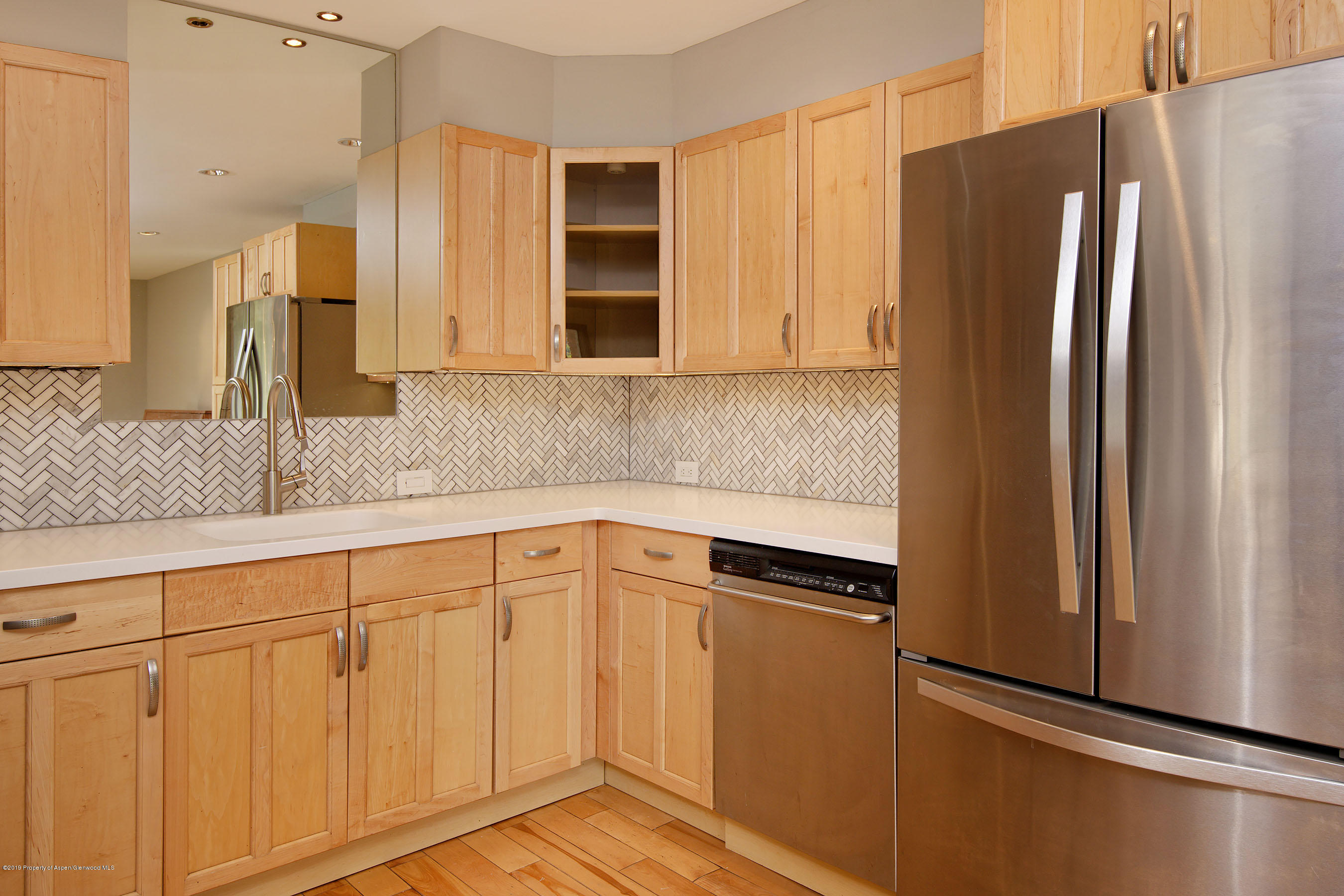 548 Holland Hills Road, Unit 4 Basalt, CO 81621 - Photo 2 of 20 a kitchen with stainless steel appliances granite countertop a refrigerator and a sink