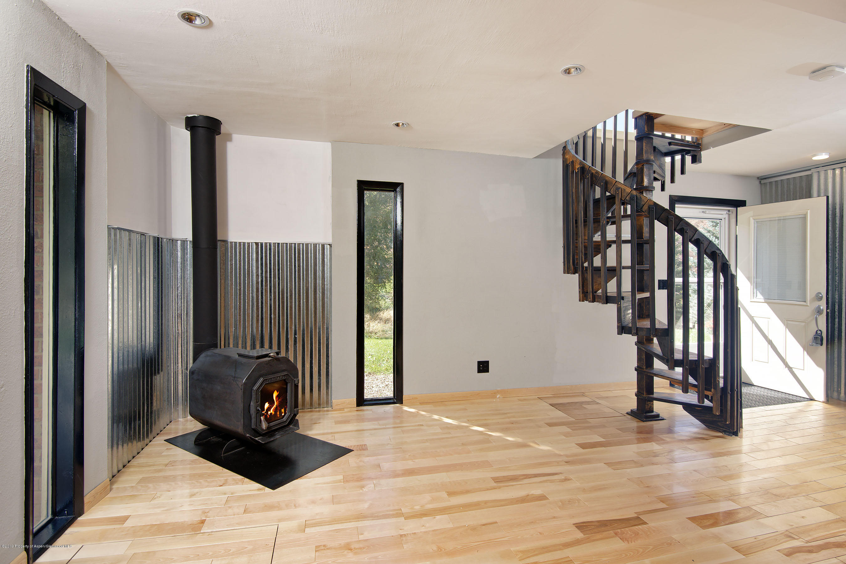548 Holland Hills Road, Unit 4 Basalt, CO 81621 - Photo 4 of 20 a view of a livingroom with furniture and staircase