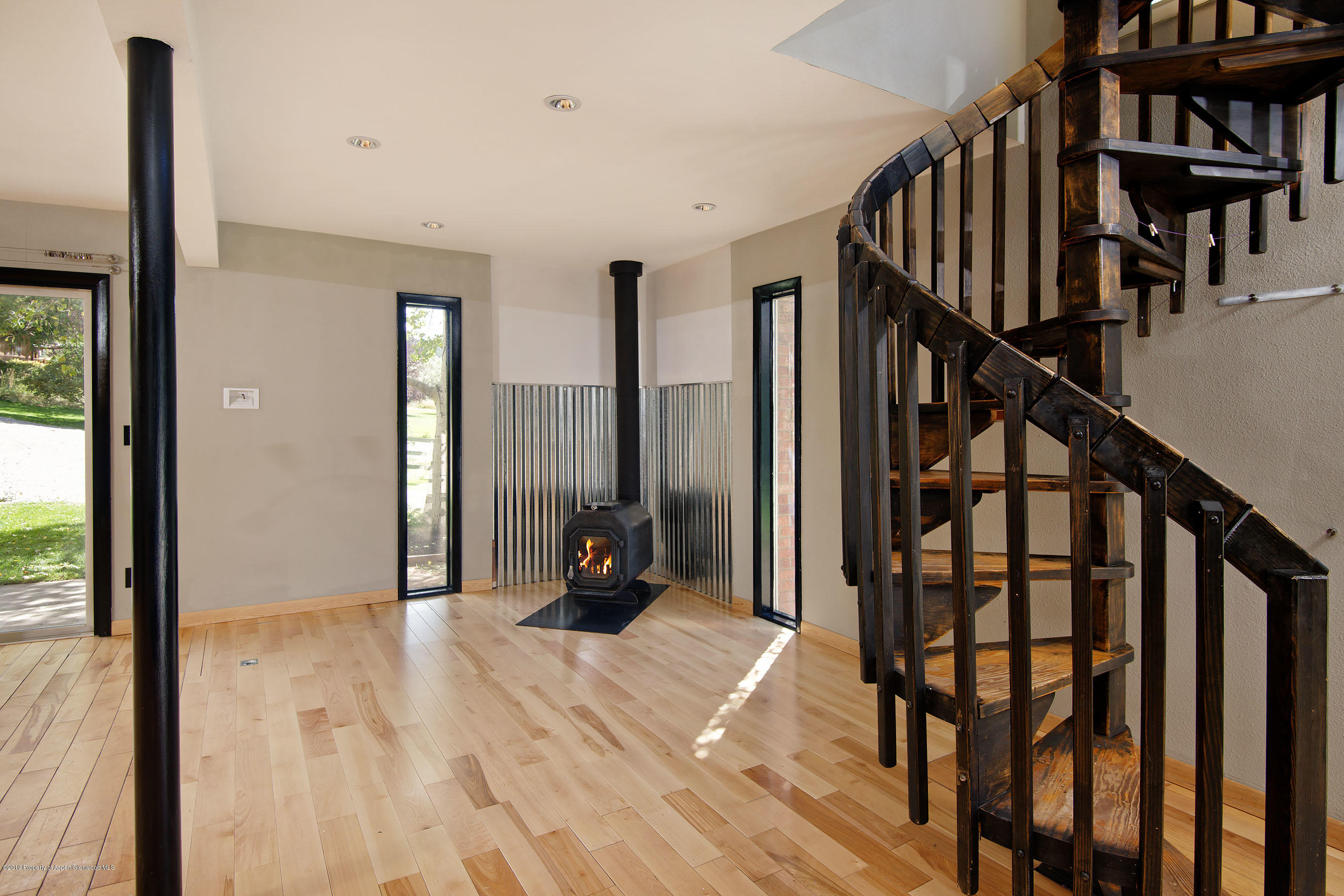 548 Holland Hills Road, Unit 4 Basalt, CO 81621 - Photo 5 of 20 a view of an entryway with wooden floor and door
