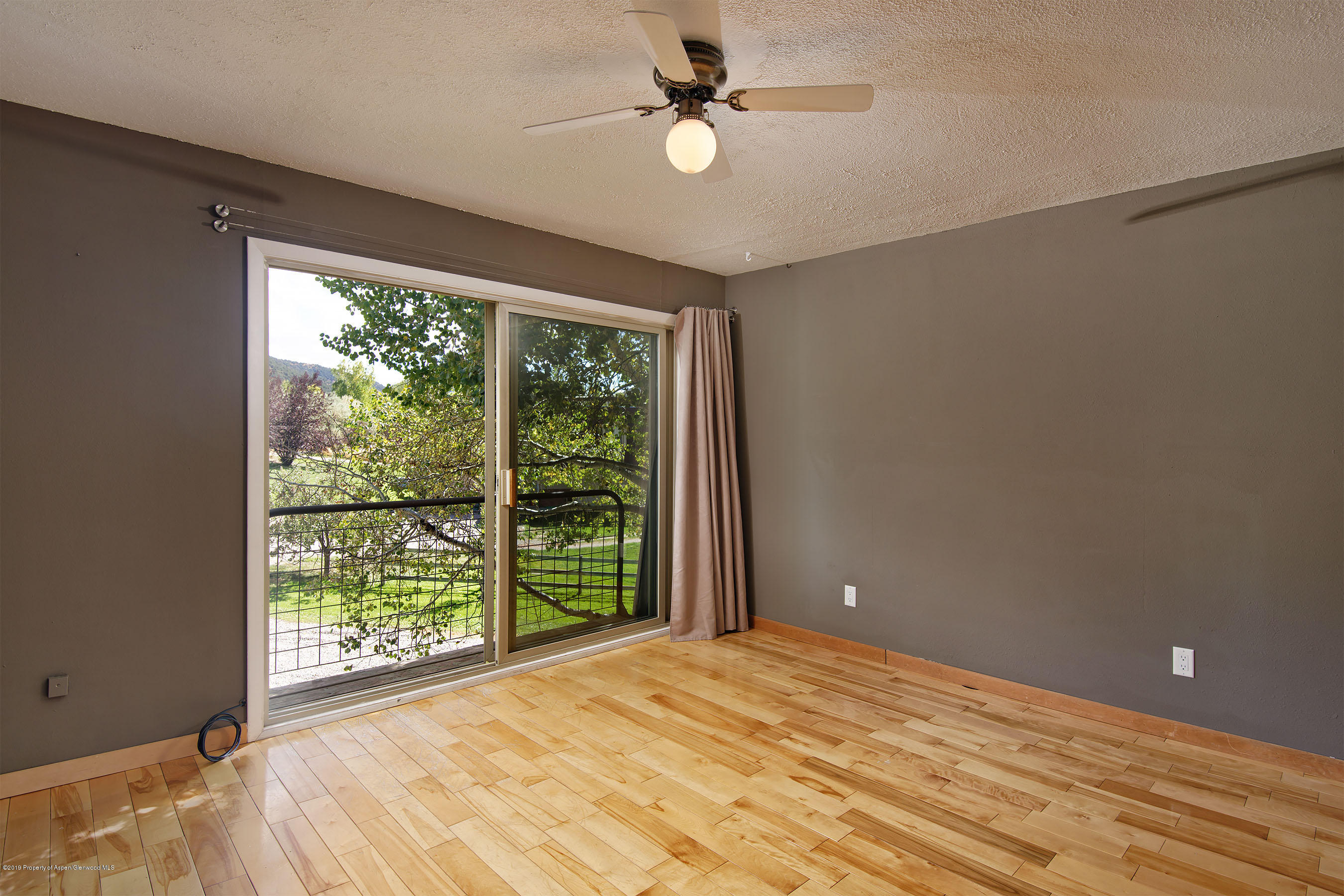 548 Holland Hills Road, Unit 4 Basalt, CO 81621 - Photo 10 of 20 a view of a room with a large window