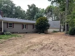 a view of backyard with green space