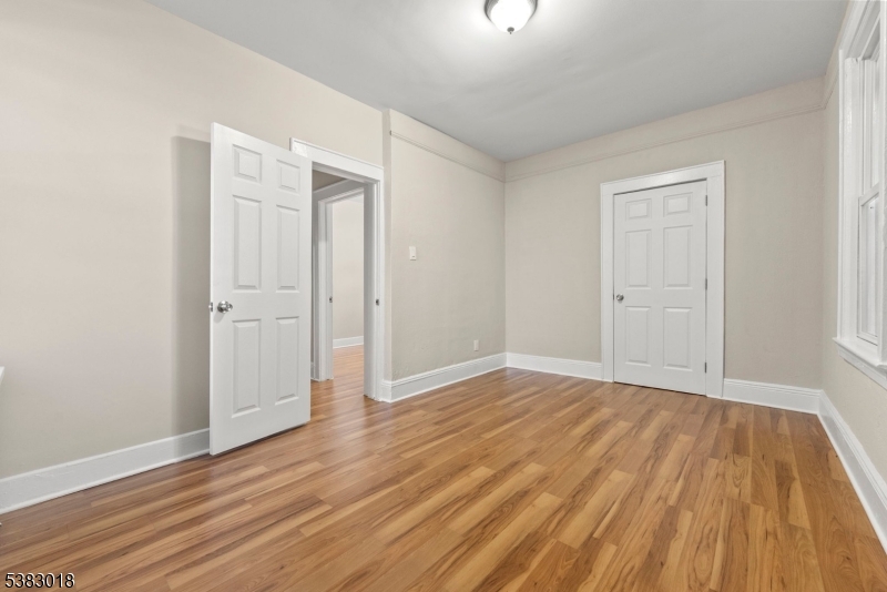 431 South 14th Street Newark, NJ 07103 - Photo 15 of 16 wooden floor in an empty room