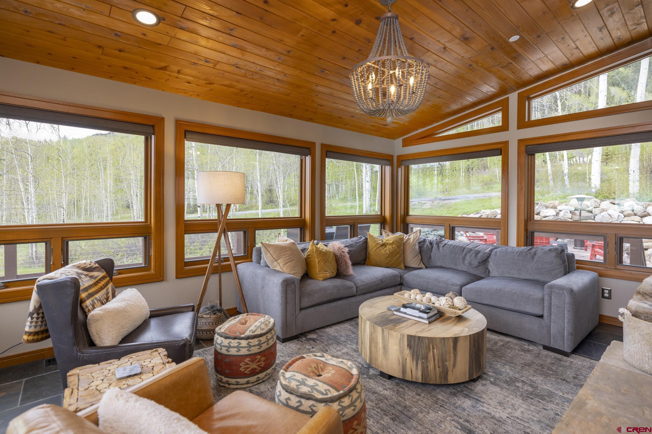 154 Falcon Ridge Road Durango, CO 81301 - Photo 12 of 42 a living room with furniture and a large window