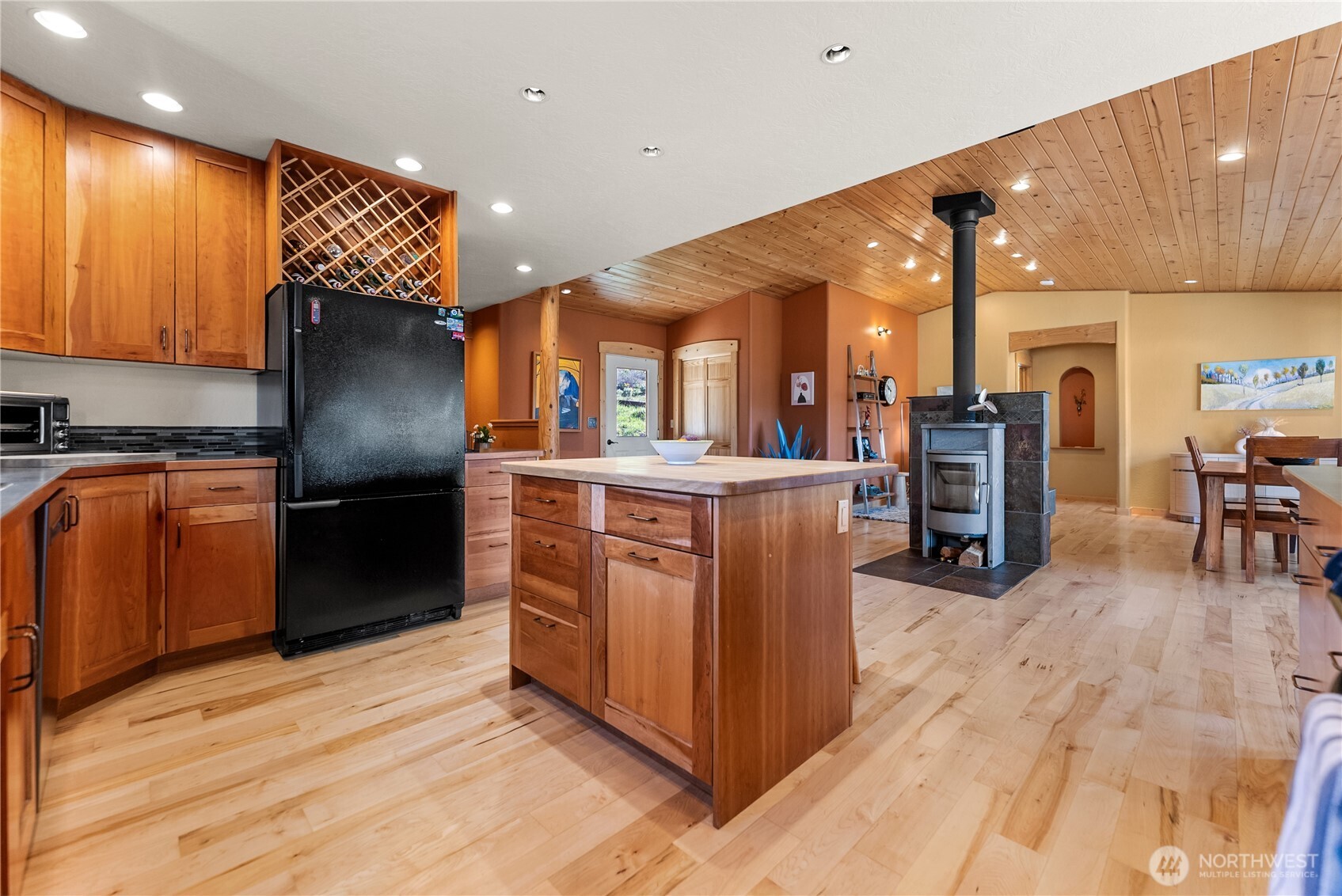 75 Rolling Rock Road Winthrop, WA 98862 - Photo 14 of 40 a kitchen with stainless steel appliances granite countertop a refrigerator a sink a stove and a wooden floors