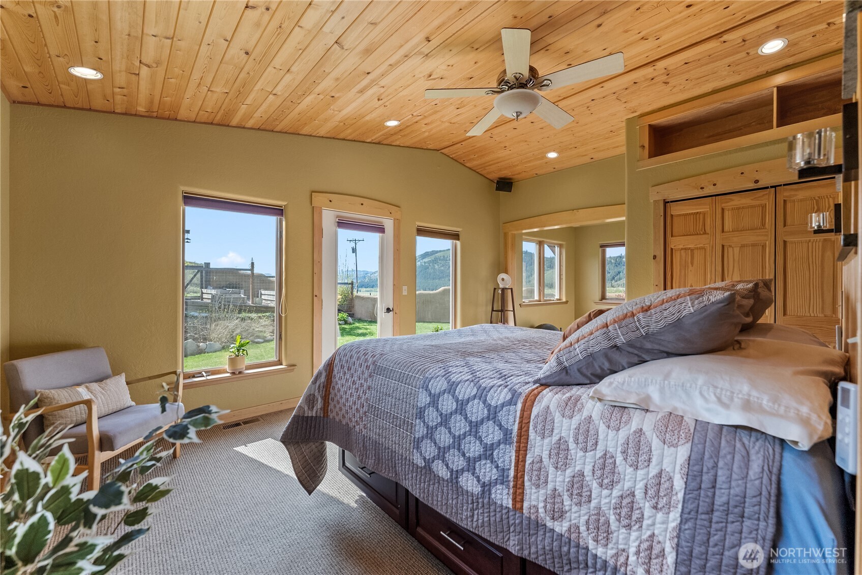 75 Rolling Rock Road Winthrop, WA 98862 - Photo 18 of 40 a bedroom with a bed window and walk in closet