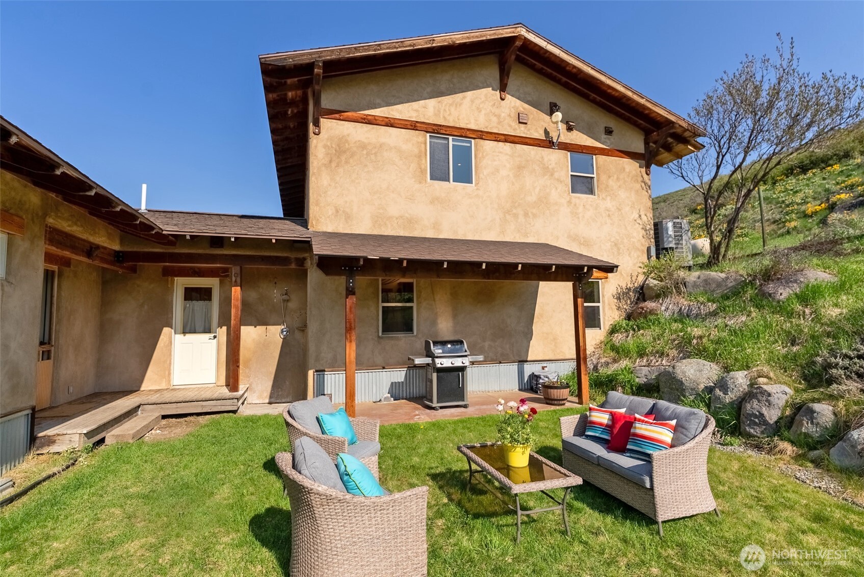 75 Rolling Rock Road Winthrop, WA 98862 - Photo 26 of 40 a front view of a house with a yard