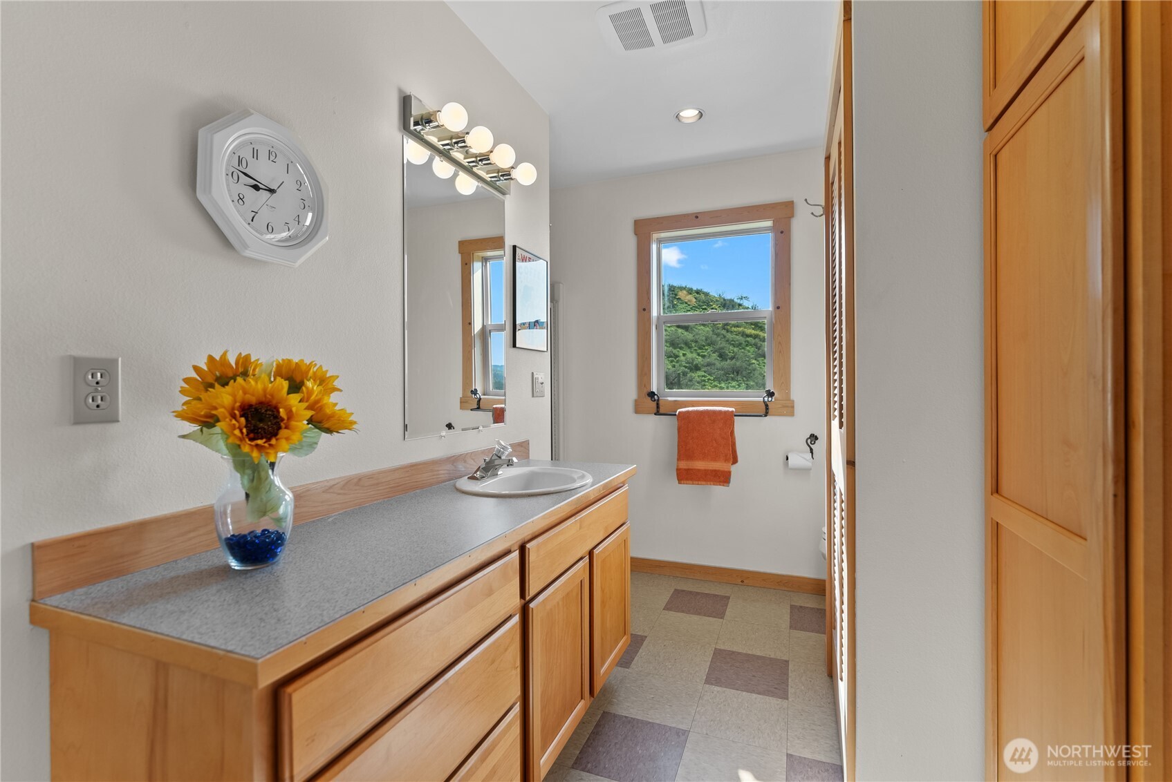 75 Rolling Rock Road Winthrop, WA 98862 - Photo 34 of 40 a bathroom with a sink a light fixture and a mirror