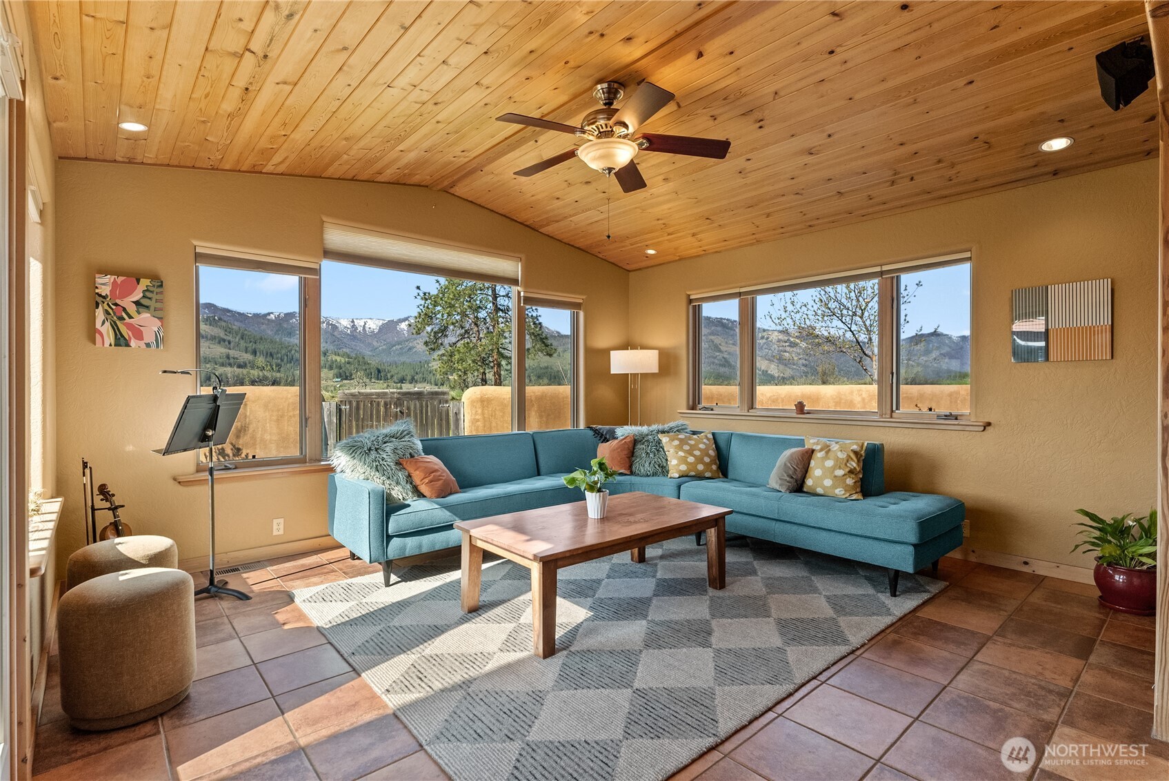 75 Rolling Rock Road Winthrop, WA 98862 - Photo 7 of 40 a living room with furniture and a large window