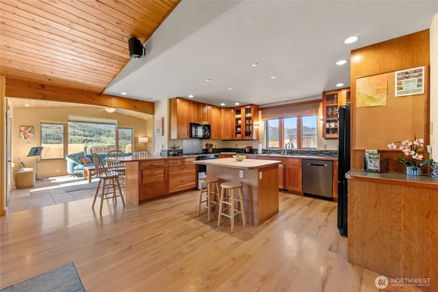 a bathroom with a toilet a sink and a mirror