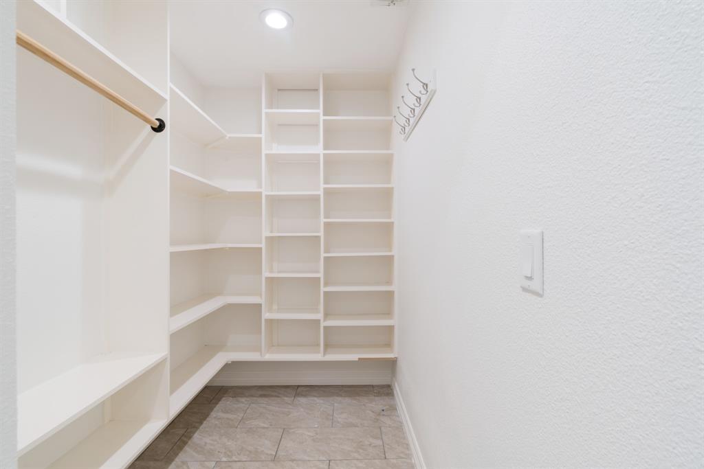 220 Laredo Drive Reno, TX 75462 - Photo 12 of 24 a view of an empty walk in closet