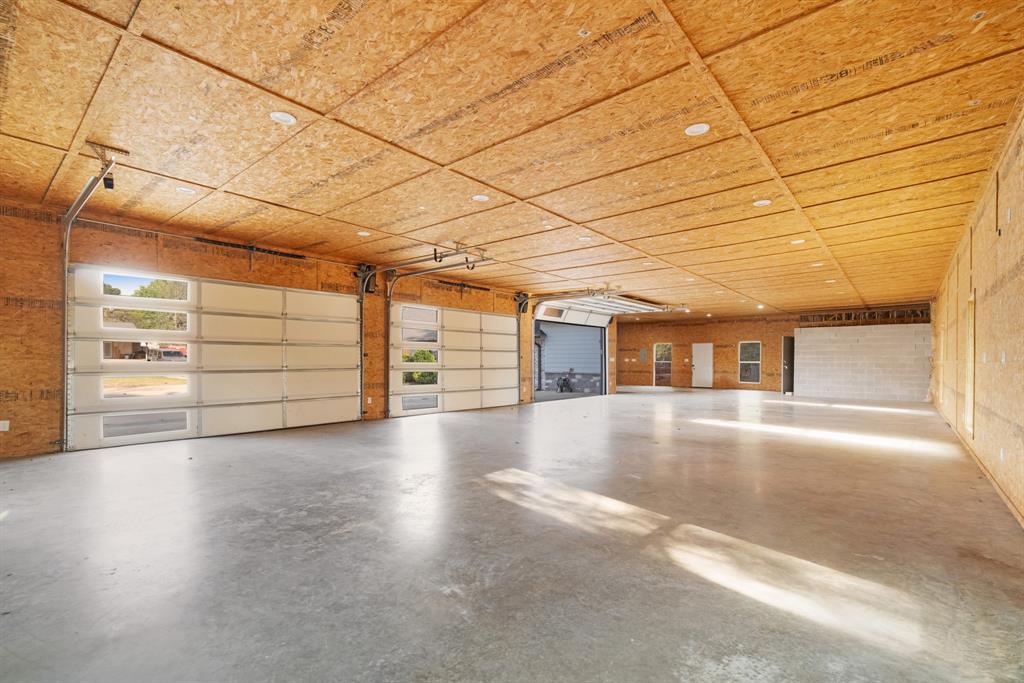 220 Laredo Drive Reno, TX 75462 - Photo 20 of 24 a view of a livingroom with a flat screen tv