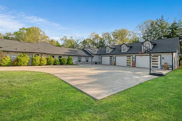 a view of house with yard