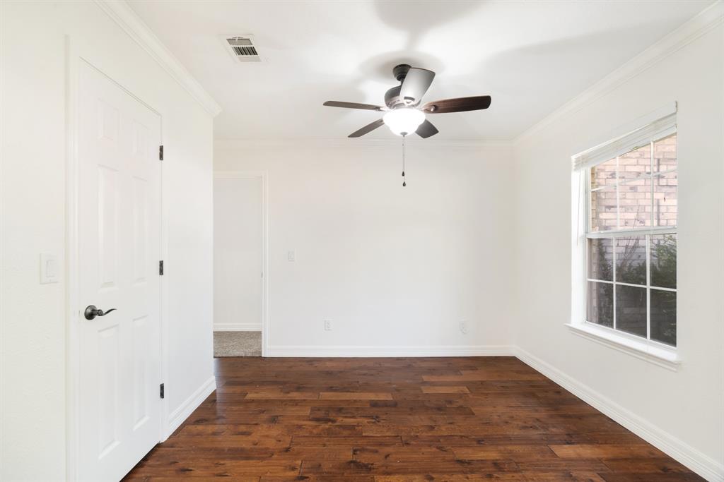 220 Laredo Drive Reno, TX 75462 - Photo 4 of 24 a view of an empty room with a window
