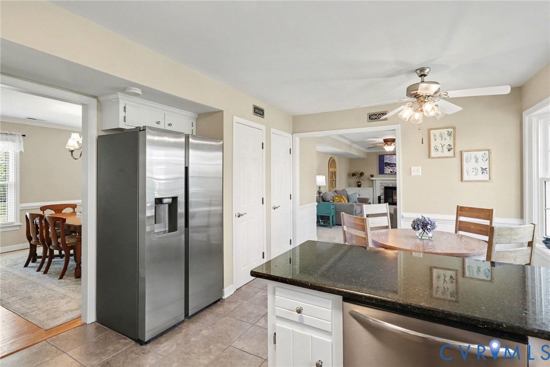 548 Glenmeadow Road Midlothian, VA 23114 - Photo 9 of 31 a kitchen with stainless steel appliances granite countertop a refrigerator and a sink