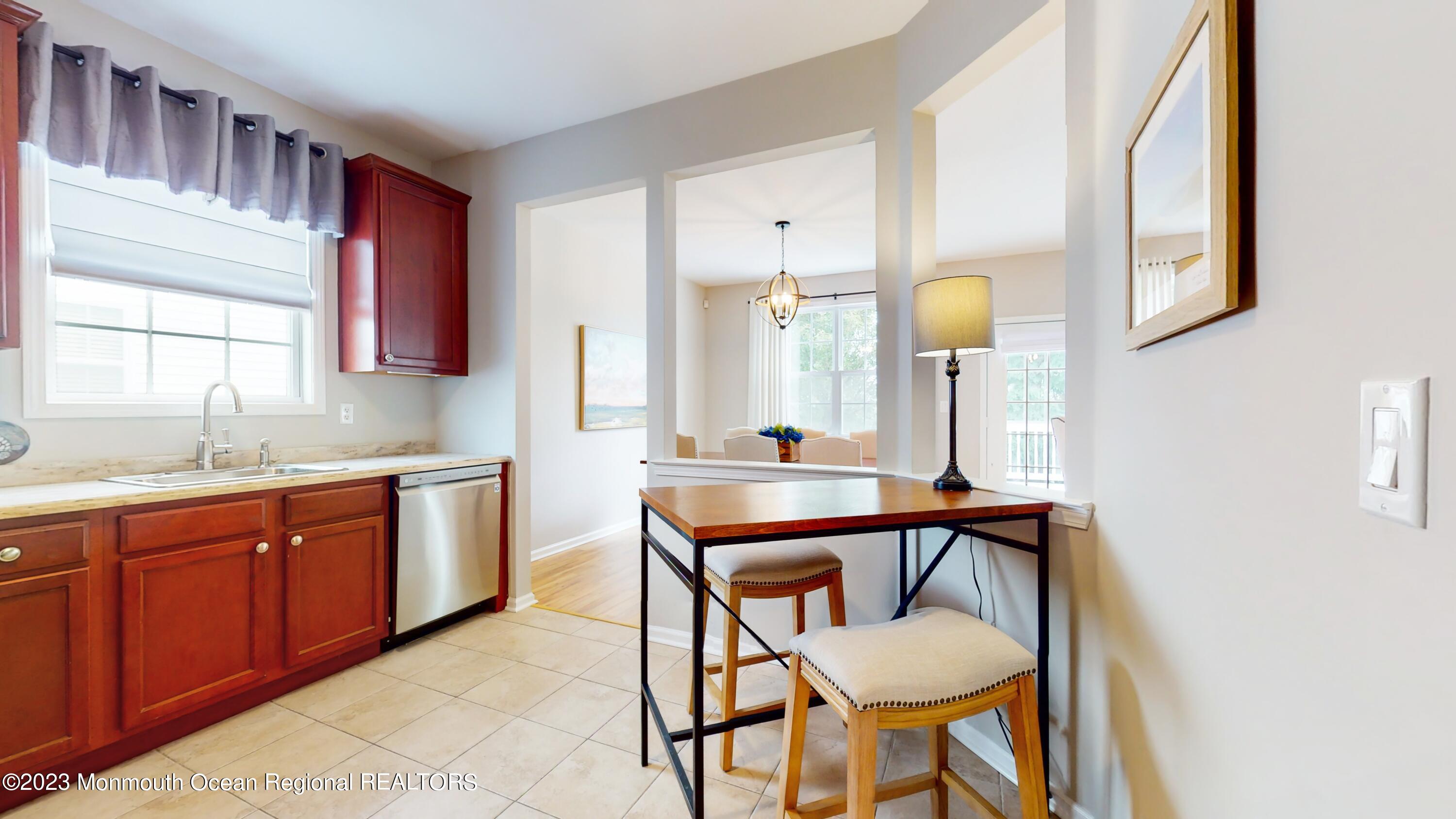 8 Silver Maple Lane Howell, NJ 07731 - Photo 12 of 27 a bathroom with a sink mirror and a bathtub