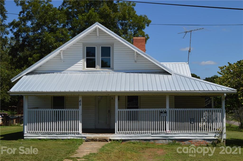 65 Alexander Road Stony Point, NC 28678 - Photo 2 of 19 a front view of a house with a balcony