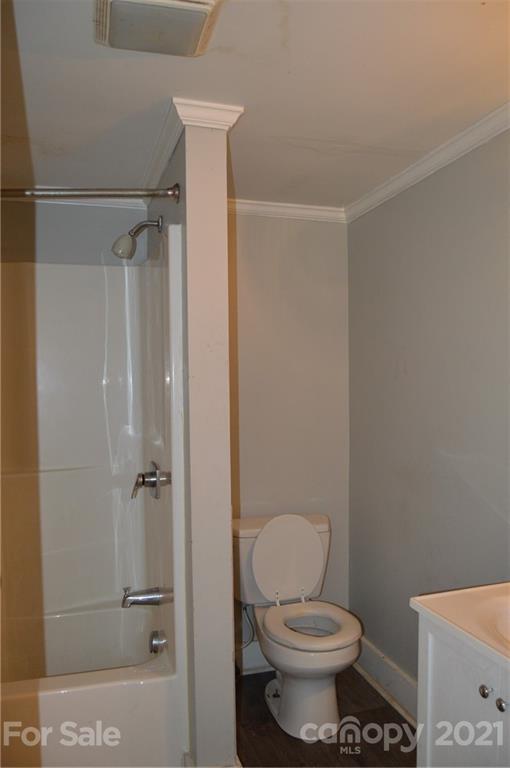 65 Alexander Road Stony Point, NC 28678 - Photo 12 of 19 a bathroom with a toilet and a shower