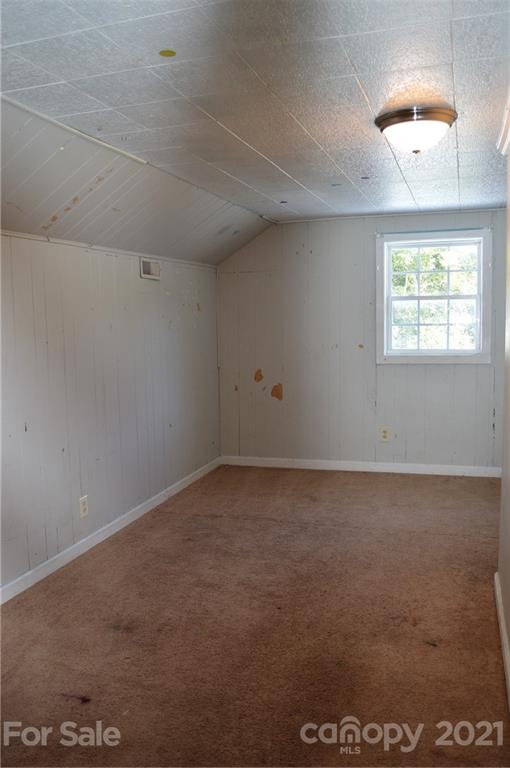 65 Alexander Road Stony Point, NC 28678 - Photo 15 of 19 an empty room with a empty space and windows