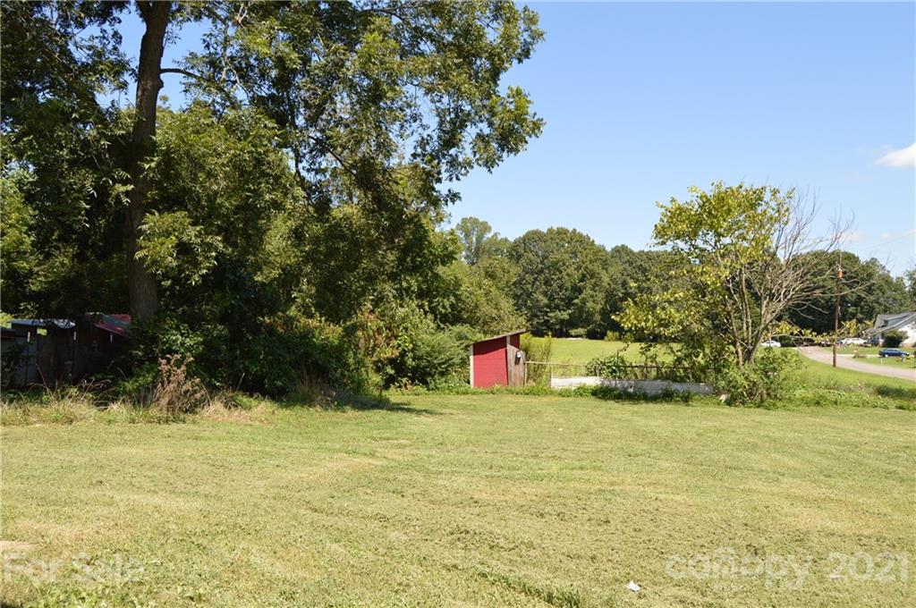 65 Alexander Road Stony Point, NC 28678 - Photo 17 of 19 a view of swimming pool with an outdoor space and seating area