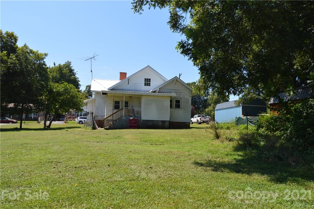 65 Alexander Road Stony Point, NC 28678 - Photo 19 of 19 a front view of a house with garden