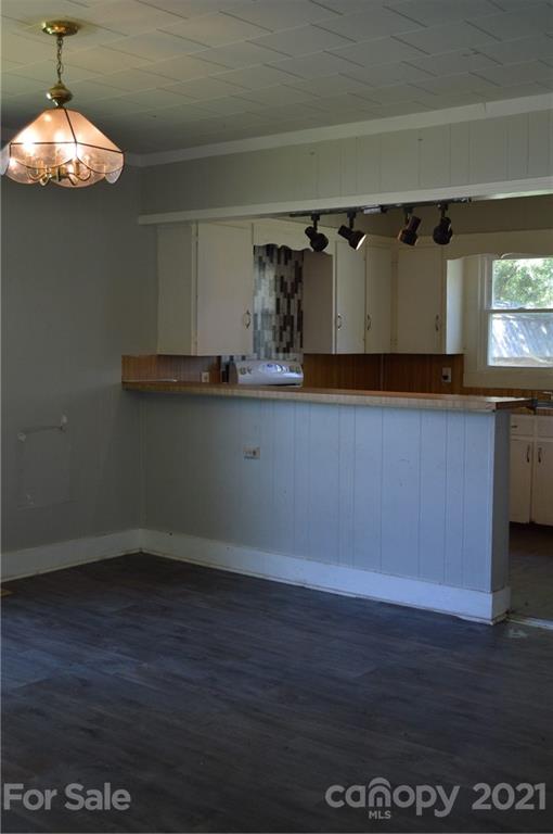 65 Alexander Road Stony Point, NC 28678 - Photo 7 of 19 a kitchen with a sink and cabinets