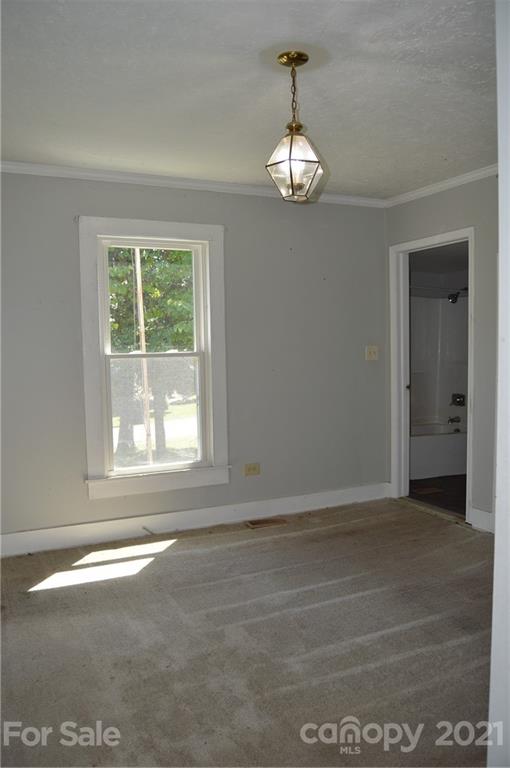 65 Alexander Road Stony Point, NC 28678 - Photo 9 of 19 a view of empty room with window