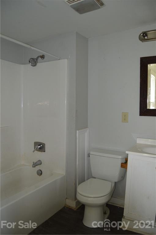 65 Alexander Road Stony Point, NC 28678 - Photo 10 of 19 a bathroom with a toilet and a shower
