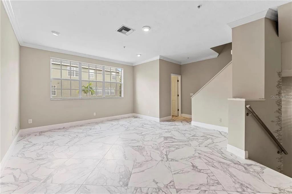 1437 Harbour Walk Road Tampa, FL 33602 - Photo 25 of 32 a view of an empty room with a window