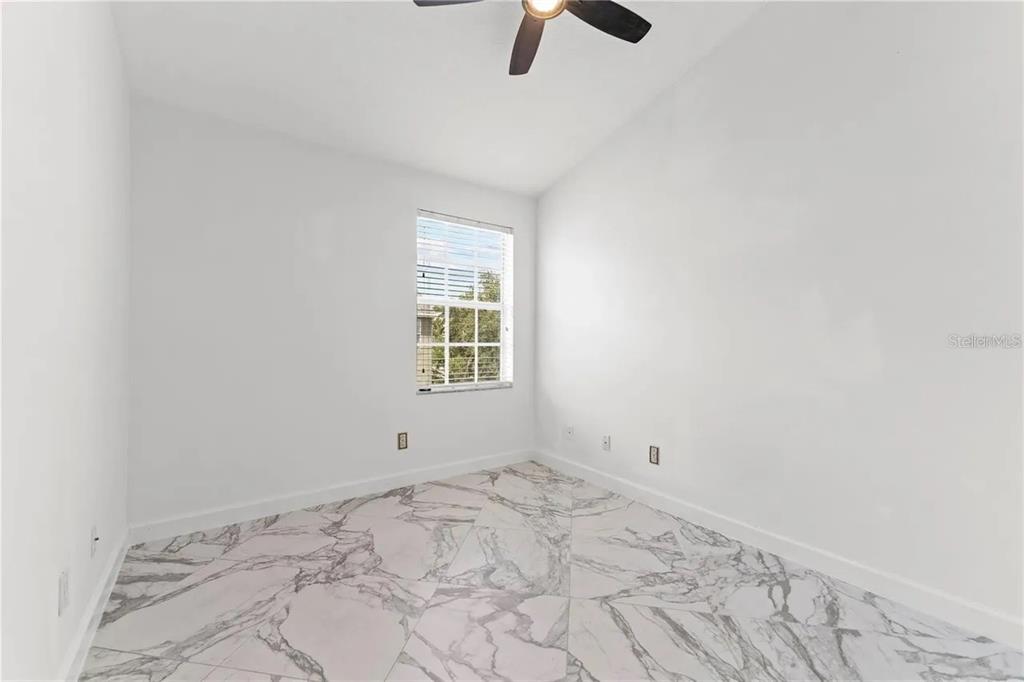 1437 Harbour Walk Road Tampa, FL 33602 - Photo 29 of 32 an empty room with windows