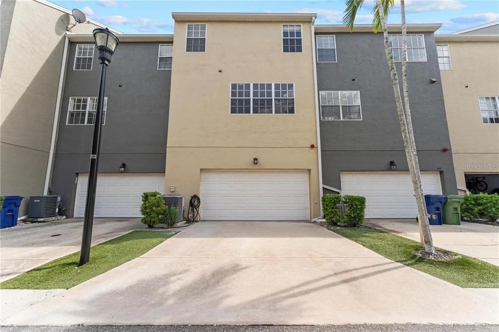 1437 Harbour Walk Road Tampa, FL 33602 - Photo 31 of 32 a front view of a house with a garden