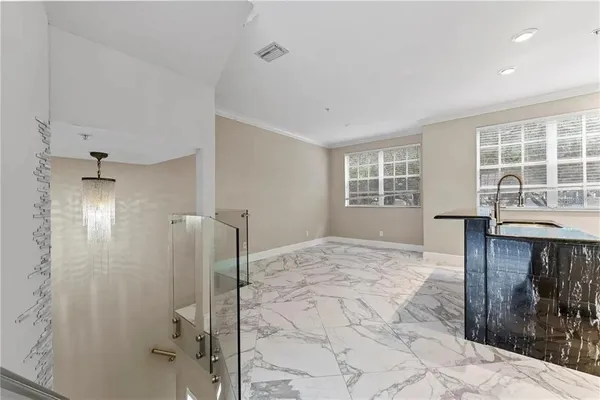 a kitchen with stainless steel appliances granite countertop a stove and a sink