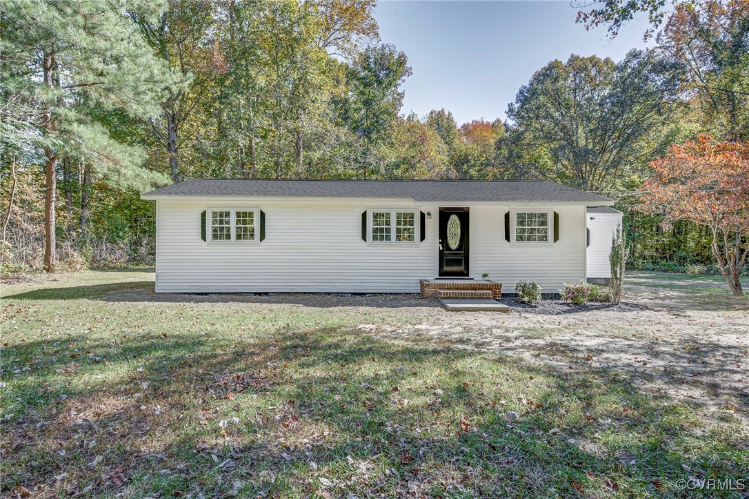 17314 Hewlett Road Beaverdam, VA 23015 - Photo 1 of 16 a house view with a backyard space