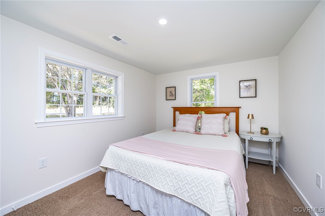 17314 Hewlett Road Beaverdam, VA 23015 - Photo 13 of 16 a bedroom with a bed and window