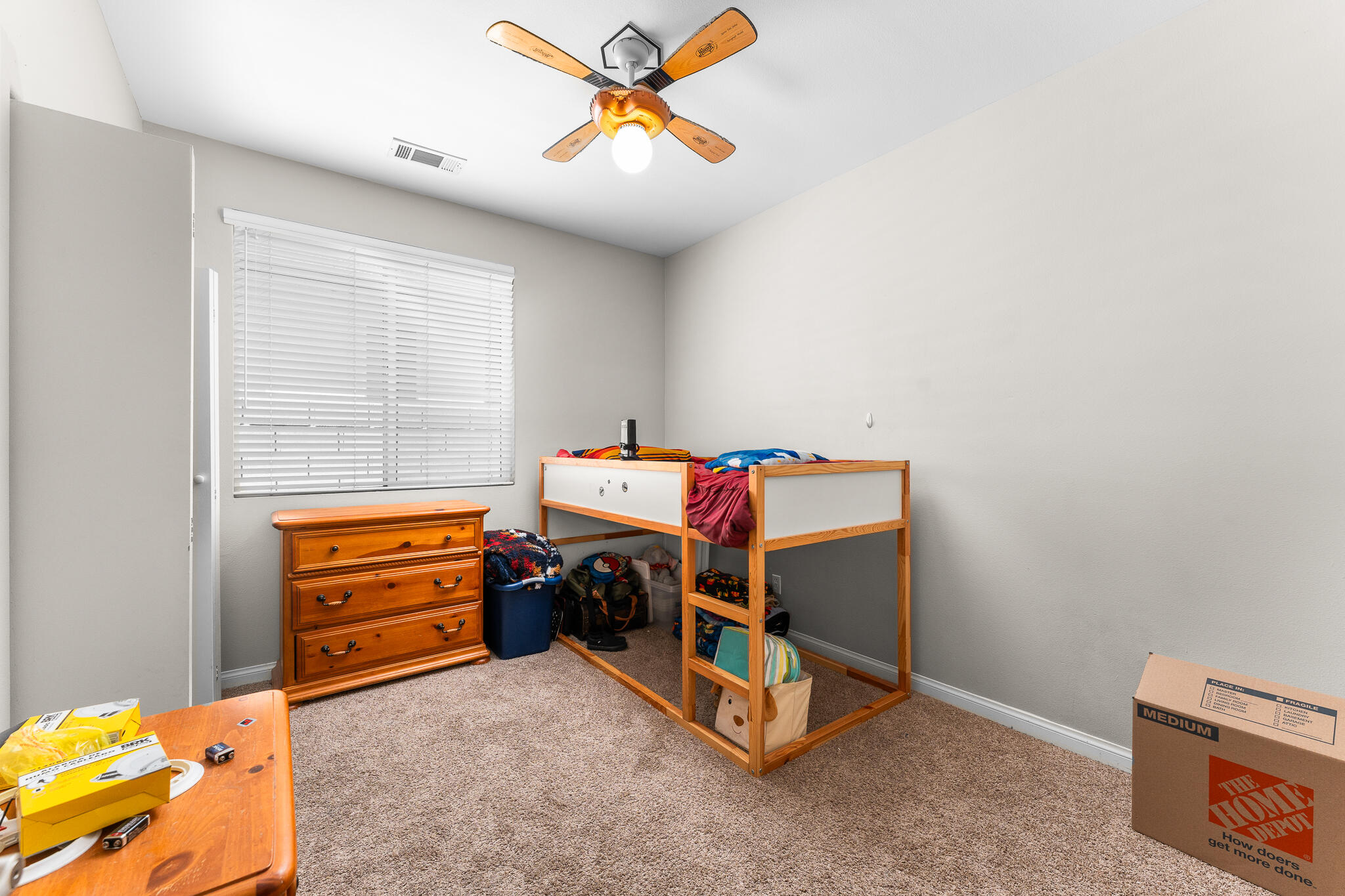 80722 Diamondback Trail Indio, CA 92201 - Photo 21 of 38 a bedroom with a bed and a chandelier