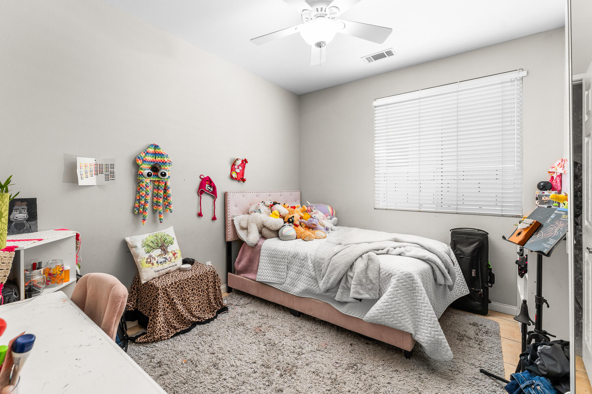 80722 Diamondback Trail Indio, CA 92201 - Photo 23 of 38 a bedroom with two beds and a chandelier